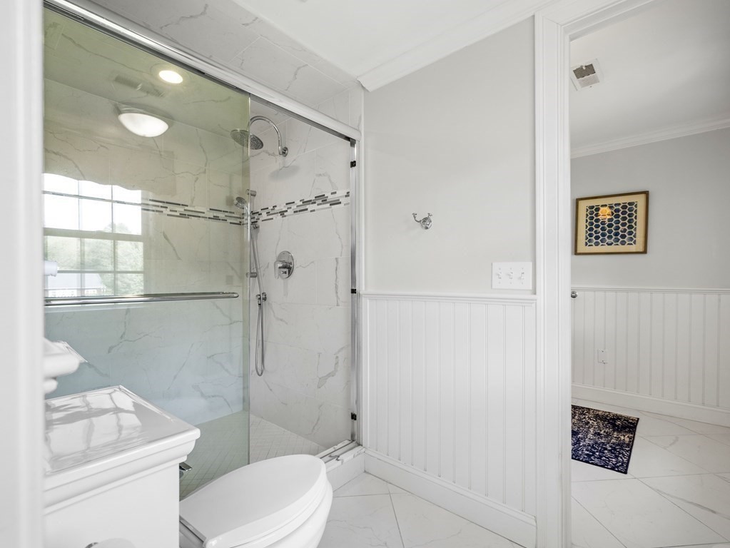 20 Jackson Road Sherborn, MA 01770 - Photo 17 of 29 a bathroom with a shower a toilet and sink