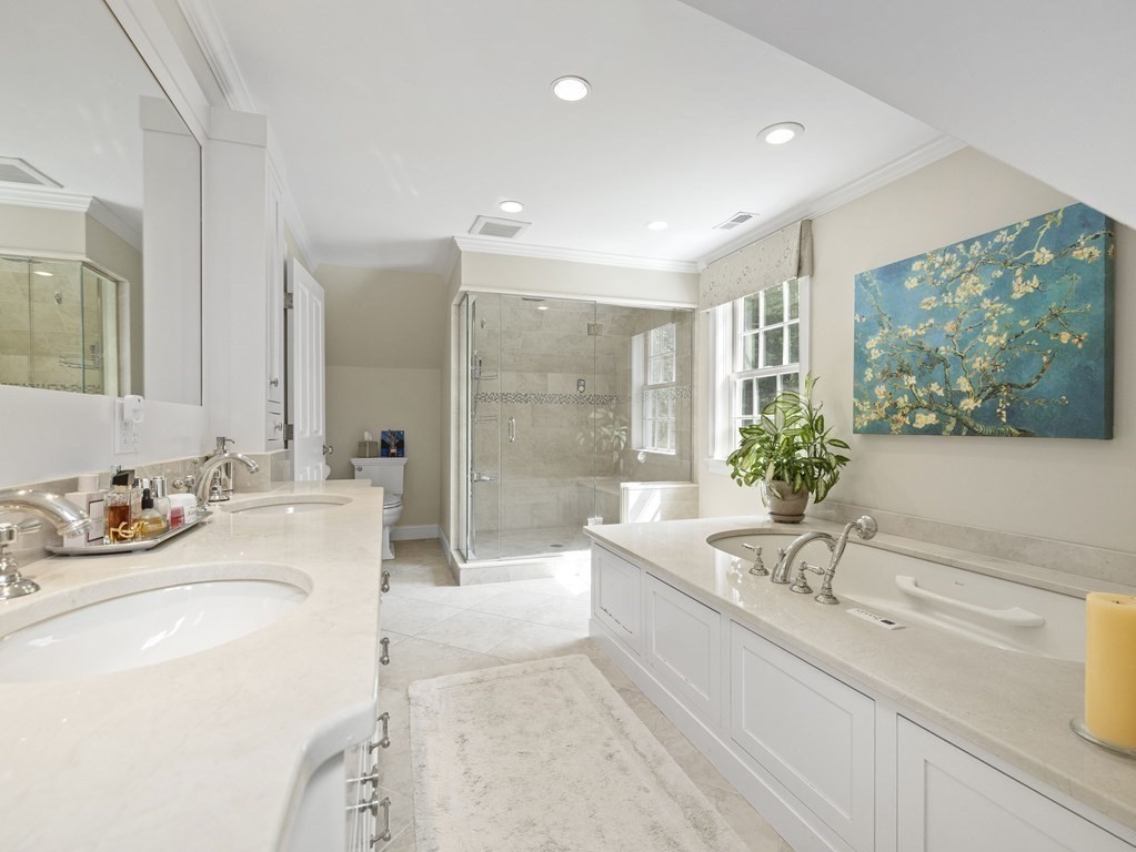20 Jackson Road Sherborn, MA 01770 - Photo 20 of 29 a spacious bathroom with a bathtub sink and mirror