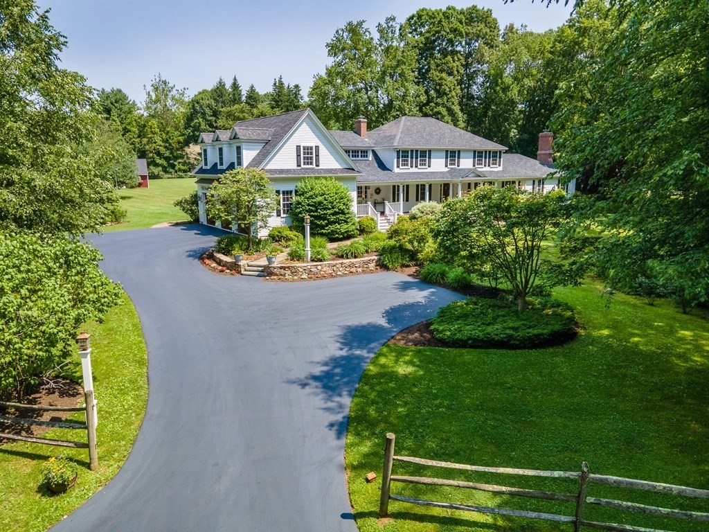 20 Jackson Road Sherborn, MA 01770 - Photo 2 of 29 a front view of a house with a yard