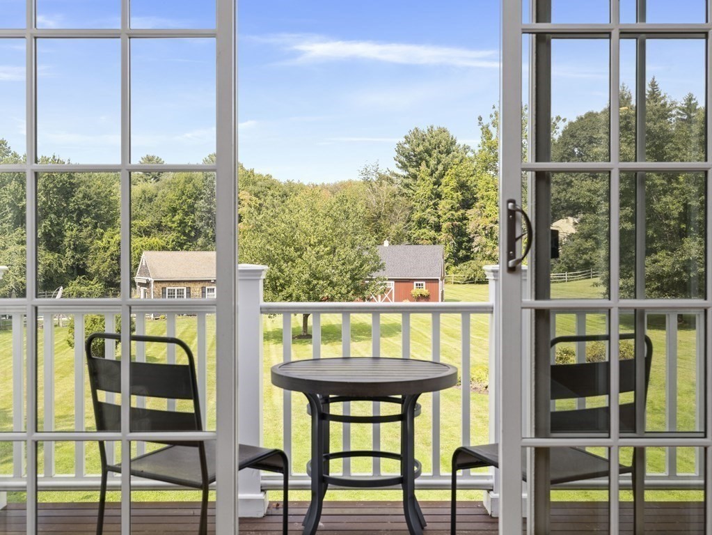 20 Jackson Road Sherborn, MA 01770 - Photo 21 of 29 a view of a balcony with chairs