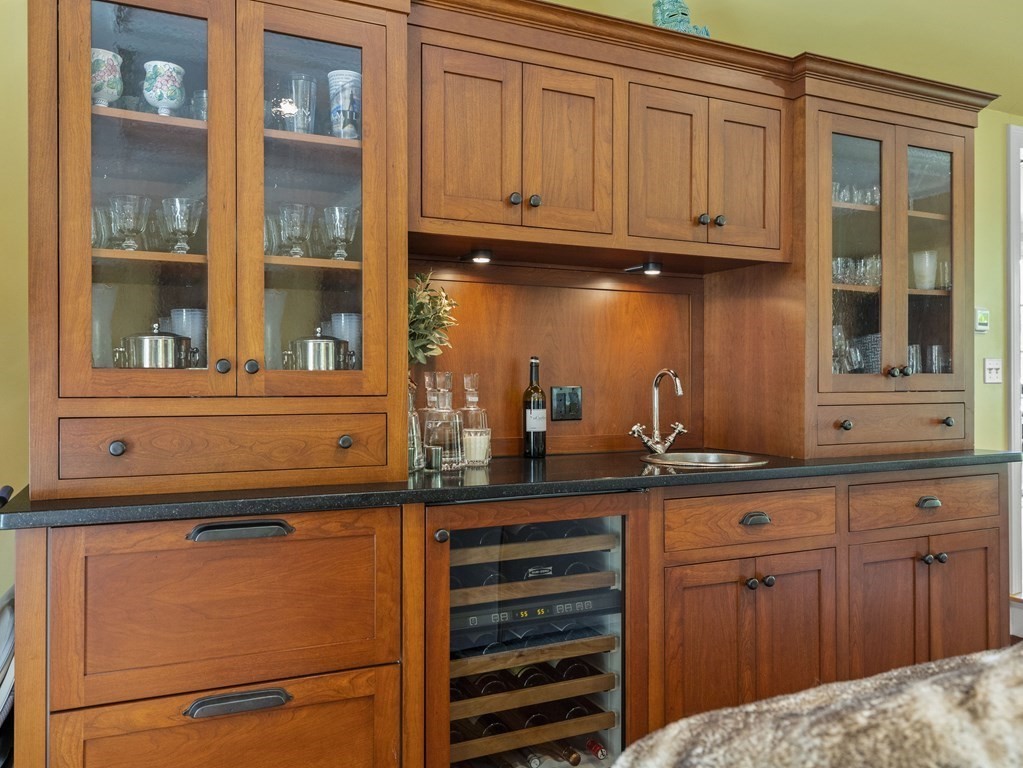 20 Jackson Road Sherborn, MA 01770 - Photo 5 of 29 a kitchen with granite countertop cabinets and window