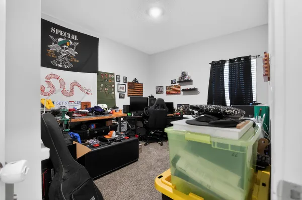 a room with furniture and a flat screen tv