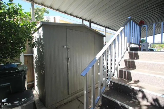 a view of a house with a yard and garage