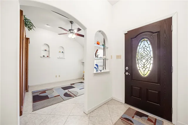 a bathroom with a toilet a sink and a mirror