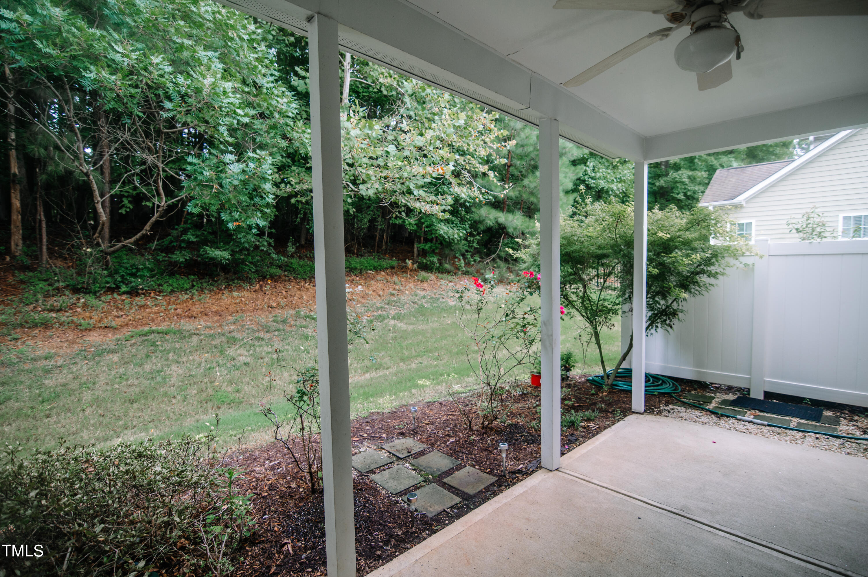 309 Deacon Ridge Street Wake Forest, NC 27587 - Photo 21 of 23 Door by seating area downstairs opens to covered back porch