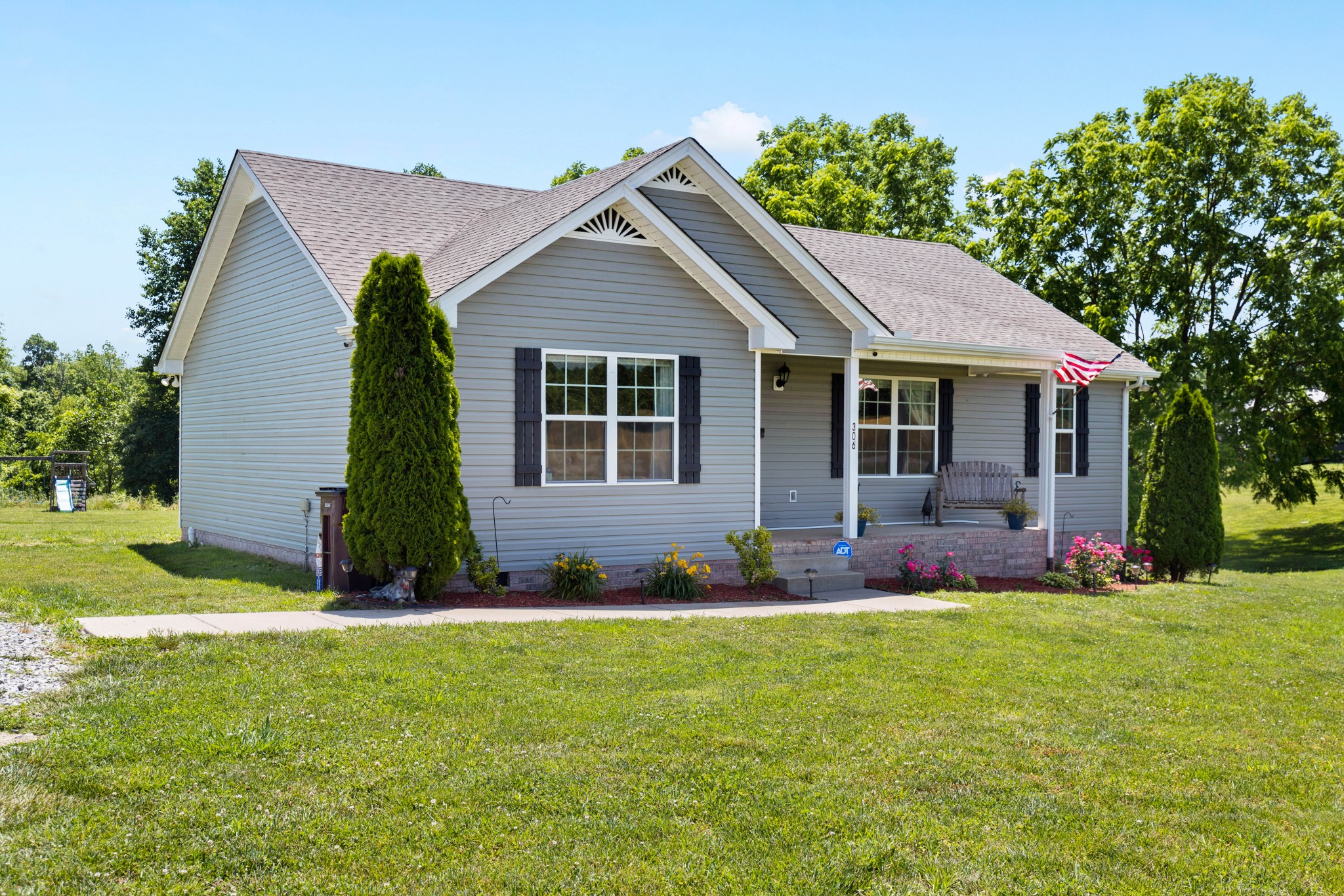 306 Meadows Road Portland, TN 37148 - Photo 3 of 31 a front view of house with yard and green space