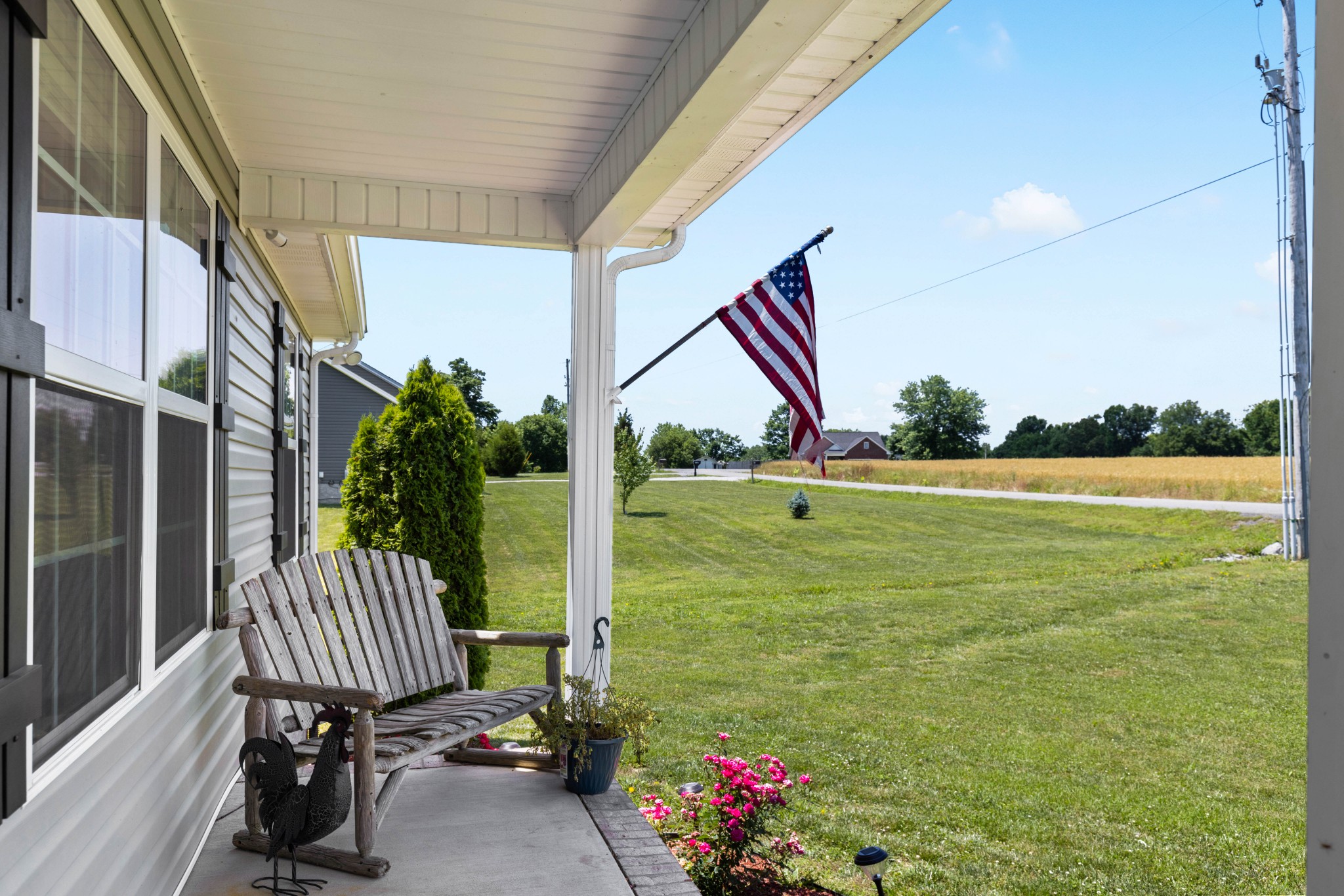 306 Meadows Road Portland, TN 37148 - Photo 5 of 31 a front view of a house with garden