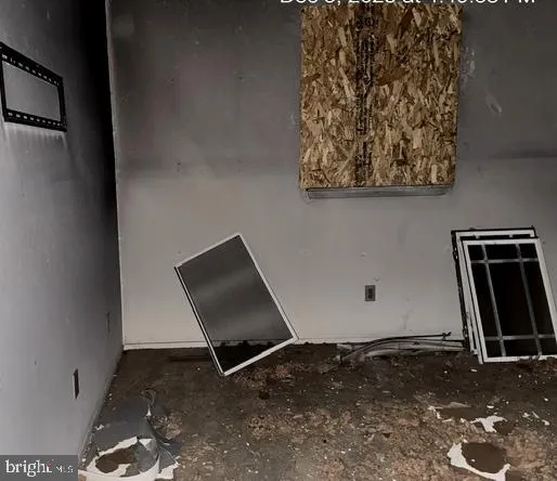 a bathroom with a toilet a sink and a mirror