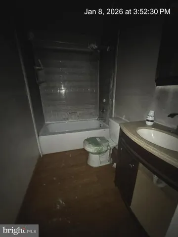 a bathroom with a sink and a toilet