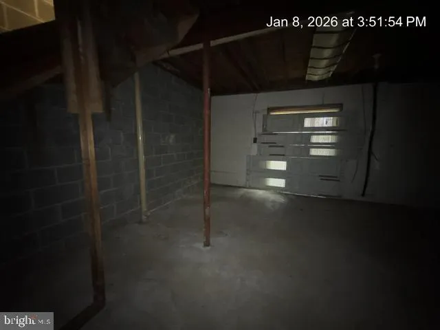 a bathroom with a sink and mirror