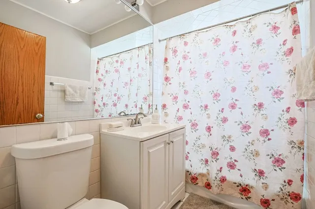 a kitchen with a sink a stove and a refrigerator