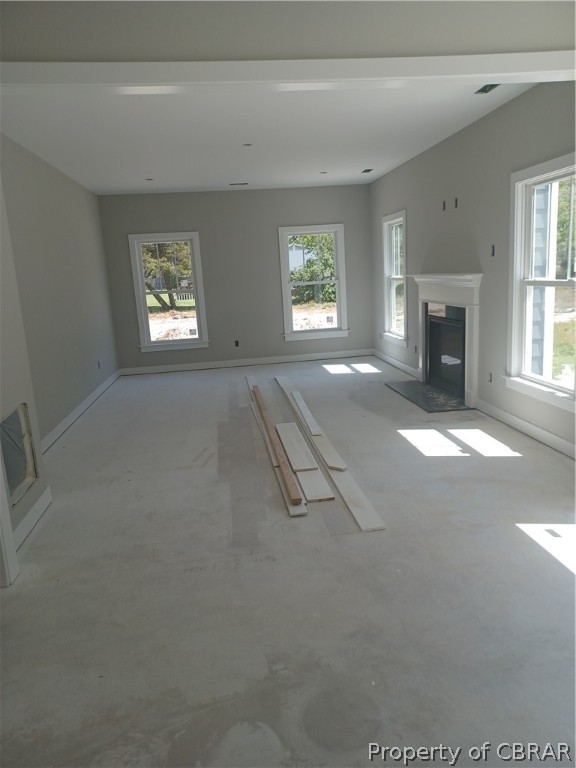 6937 Williams Landing Road Hayes, VA 23072 - Photo 8 of 14 Unfurnished living room featuring concrete flooring