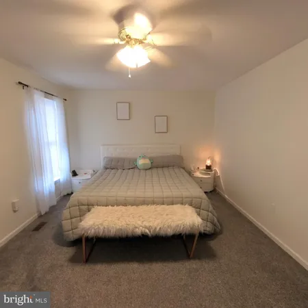 a view of room with flat screen tv