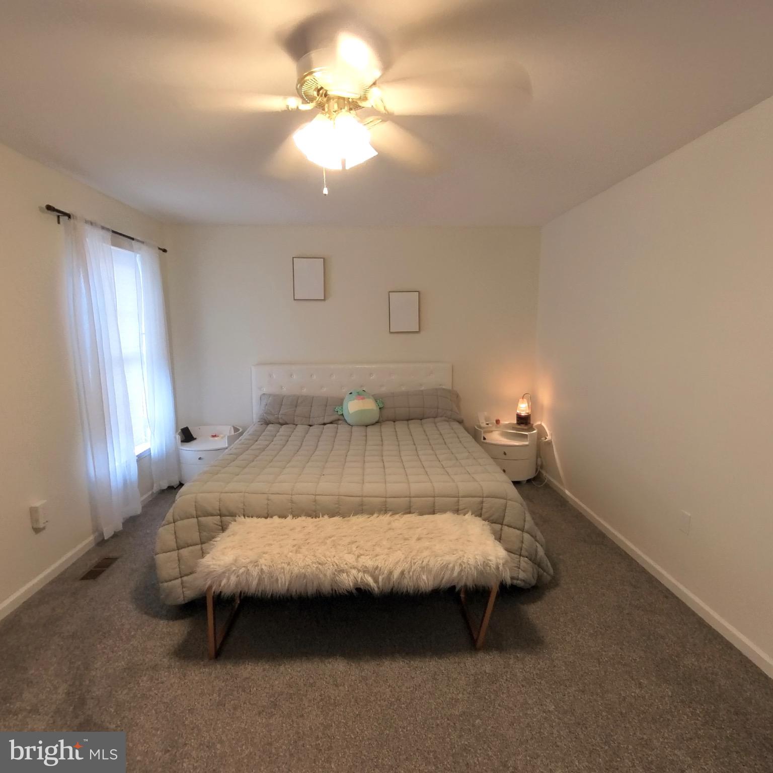 20 Mellowbrook Drive Reading, PA 19608 - Photo 18 of 39 a bedroom with a bed and a chandelier