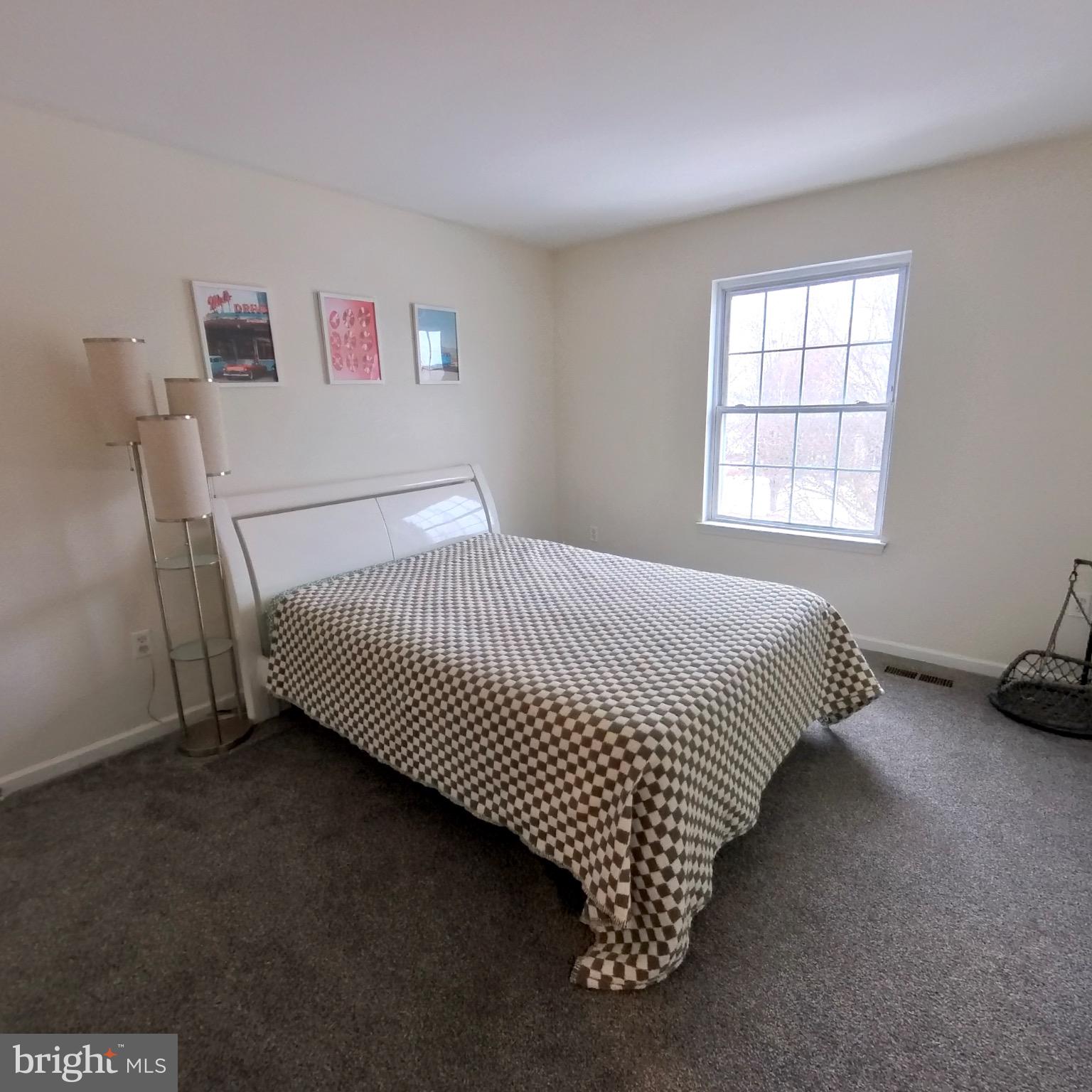 20 Mellowbrook Drive Reading, PA 19608 - Photo 22 of 39 a bed sitting in a bedroom next to a window