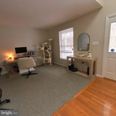 a bed room with a bed and a window