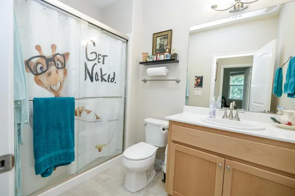 a view of a workspace with furniture and a potted plant