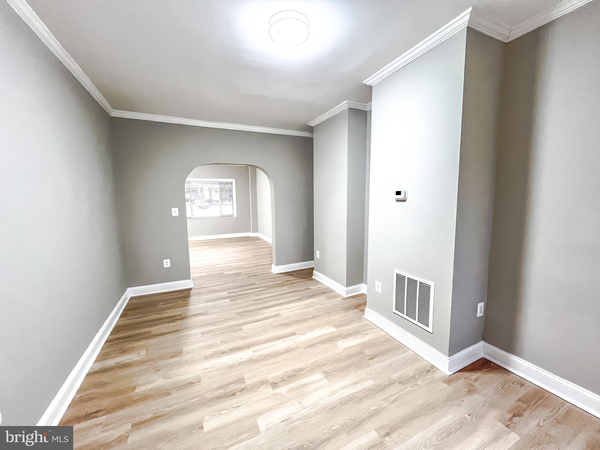 3204 Sequoia Avenue Baltimore, MD 21215 - Photo 17 of 19 a view of wooden floor and a living room