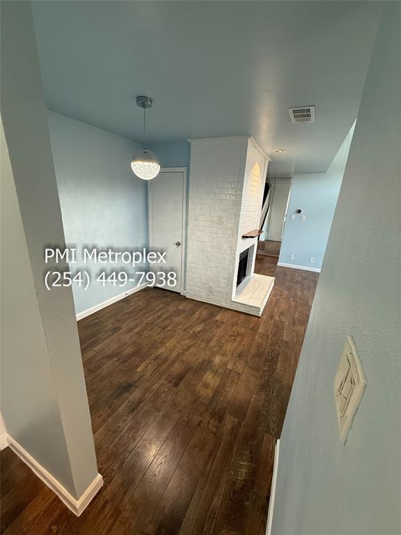 18240 Midway Road, Unit 606 Dallas, TX 75287 - Photo 11 of 25 a view of a hallway to a room