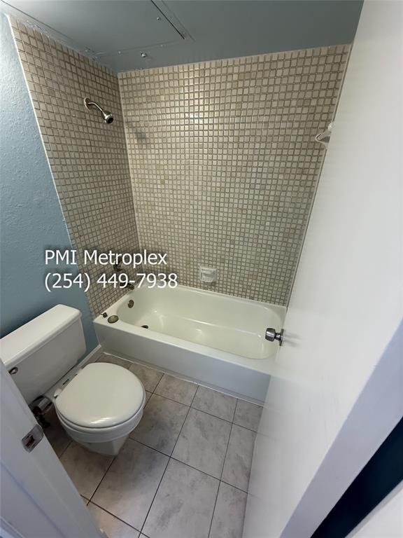 18240 Midway Road, Unit 606 Dallas, TX 75287 - Photo 20 of 25 a bathroom with a toilet and a shower
