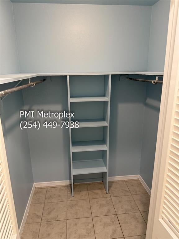 18240 Midway Road, Unit 606 Dallas, TX 75287 - Photo 25 of 25 a view of room with walk in closet