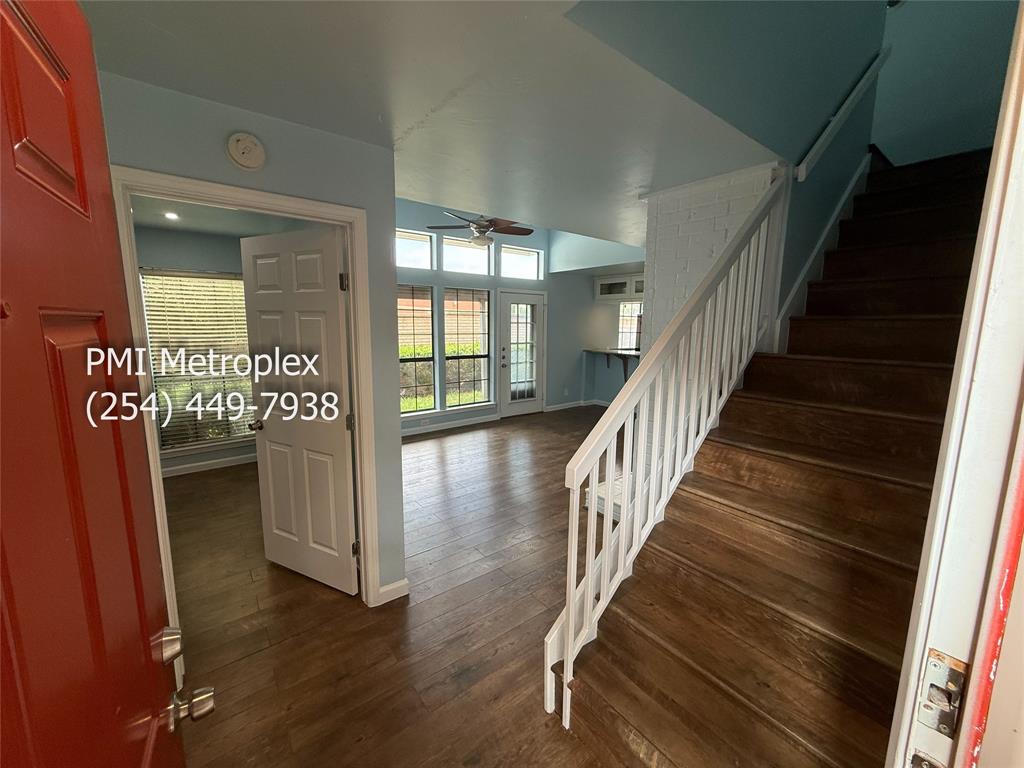 18240 Midway Road, Unit 606 Dallas, TX 75287 - Photo 3 of 25 a view of entryway and hall with wooden floor