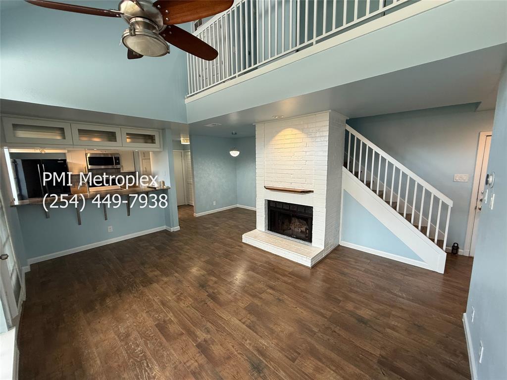 18240 Midway Road, Unit 606 Dallas, TX 75287 - Photo 8 of 25 a view of entryway and hall with wooden floor