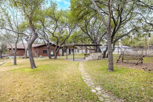 a house with trees in front of it