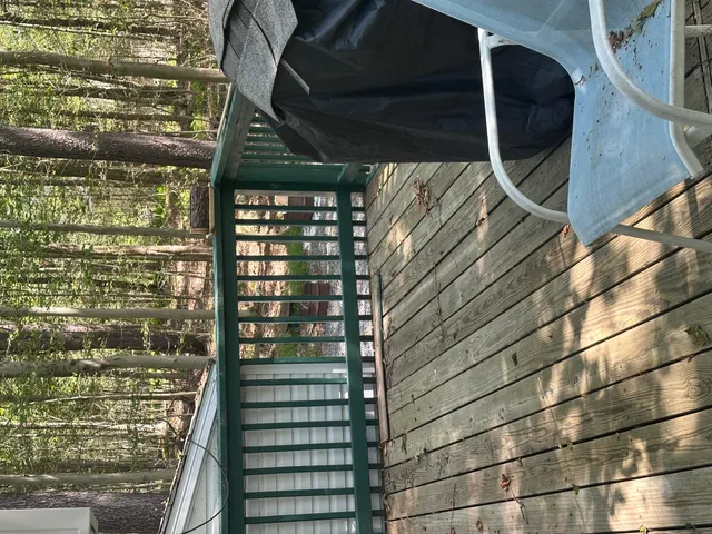 a view of a livingroom with furniture