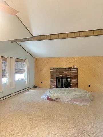 a view of a big room with large windows