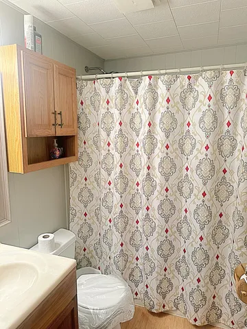 a bathroom with a sink and a toilet