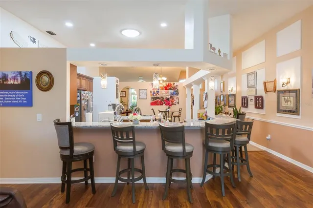 a living room with fireplace furniture and a fireplace