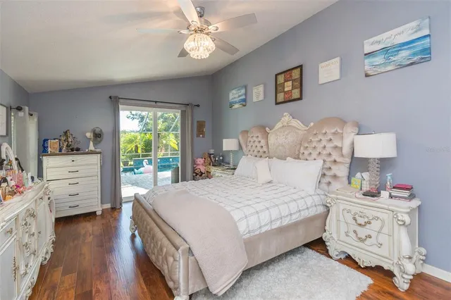 a spacious bathroom with a double vanity sink mirror and bathtub