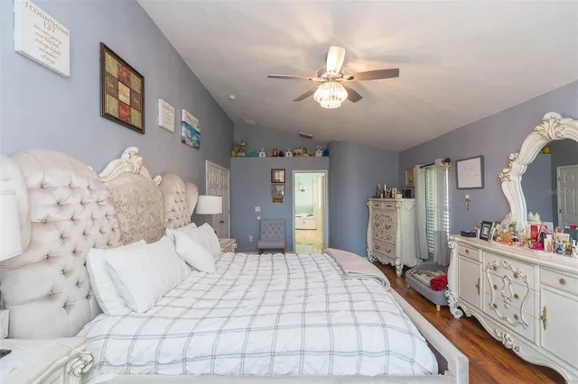 a bathroom with a double vanity sink mirror and shower
