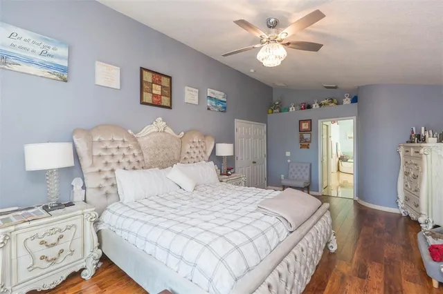 a bathroom with a sink a light fixture and a mirror