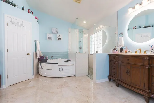 a bathroom with a sink a toilet and a bathtub