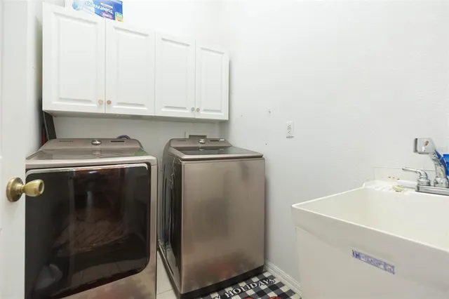 a view of a chairs and table in a patio