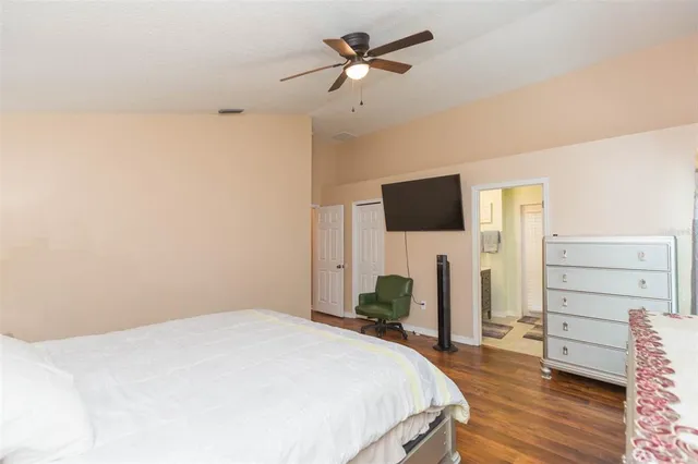 a backyard of a house with a yard and outdoor seating