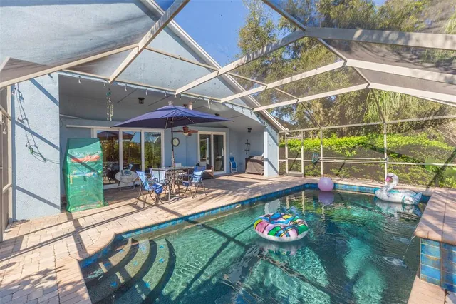 an aerial view of residential building and ocean