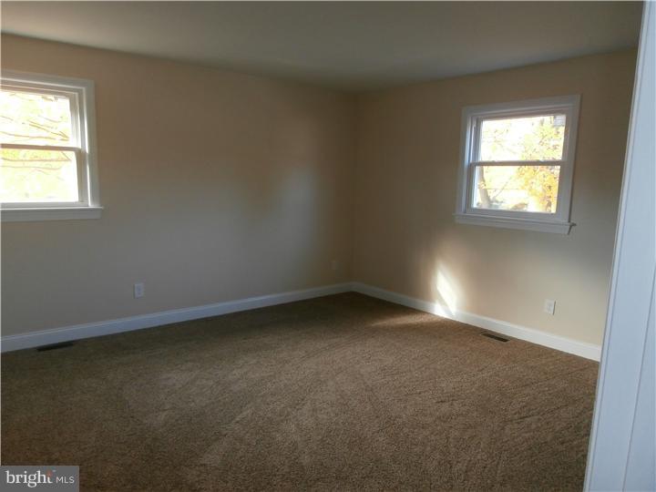 201 Kent Road Williamstown, NJ 08094 - Photo 5 of 11 an empty room with a window