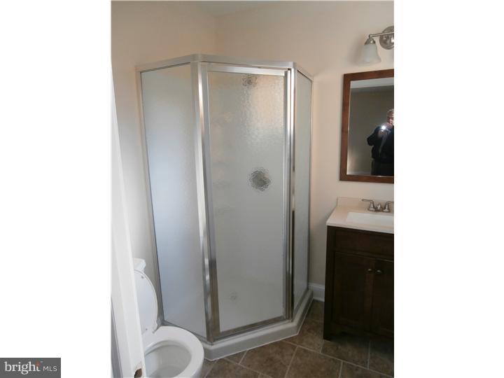 201 Kent Road Williamstown, NJ 08094 - Photo 8 of 11 a bathroom with a granite countertop sink and a mirror