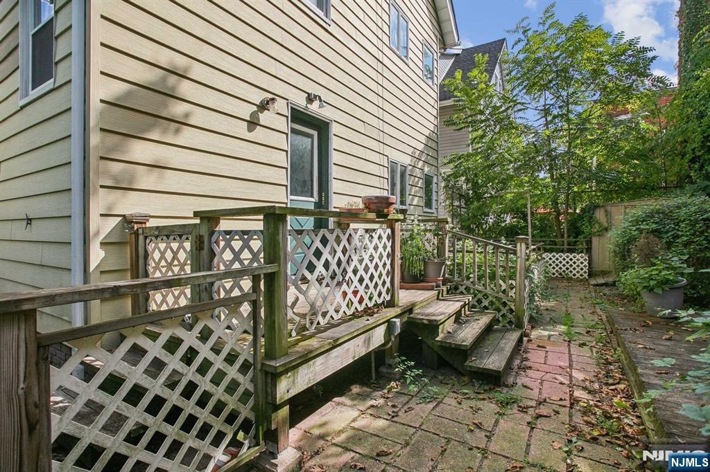 16 Henry Street, Unit 3 Bloomfield, NJ 07003 - Photo 18 of 21 a balcony with a bench and white walls