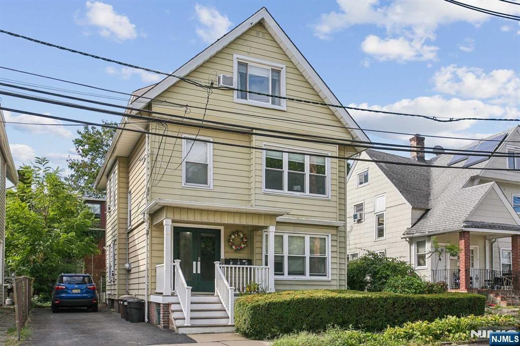 16 Henry Street, Unit 3 Bloomfield, NJ 07003 - Photo 2 of 21 a front view of a house with a porch