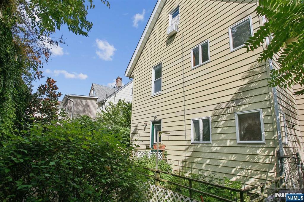 16 Henry Street, Unit 3 Bloomfield, NJ 07003 - Photo 21 of 21 a view of a house with a yard