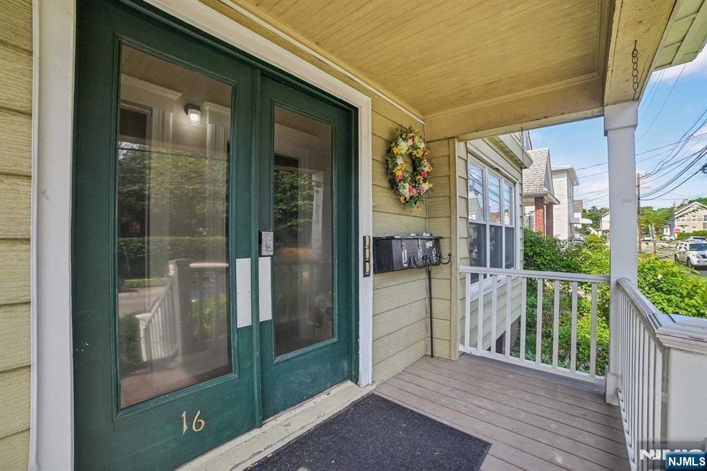 16 Henry Street, Unit 3 Bloomfield, NJ 07003 - Photo 6 of 21 a balcony with wooden floor