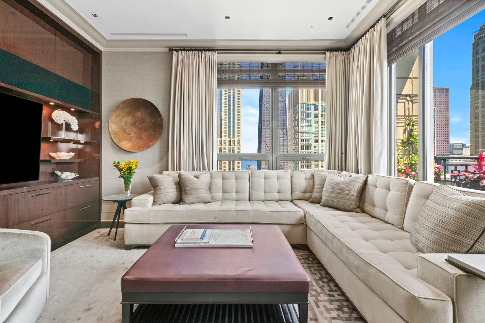 10 East Delaware Place, Unit 34A Chicago, IL 60611 - Photo 11 of 51 a living room with furniture and a large window