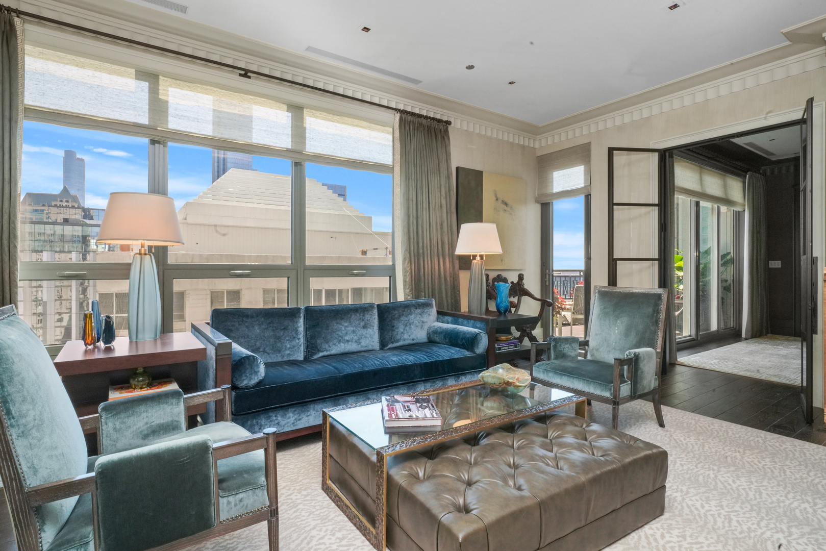 10 East Delaware Place, Unit 34A Chicago, IL 60611 - Photo 17 of 51 a living room with furniture and a large window