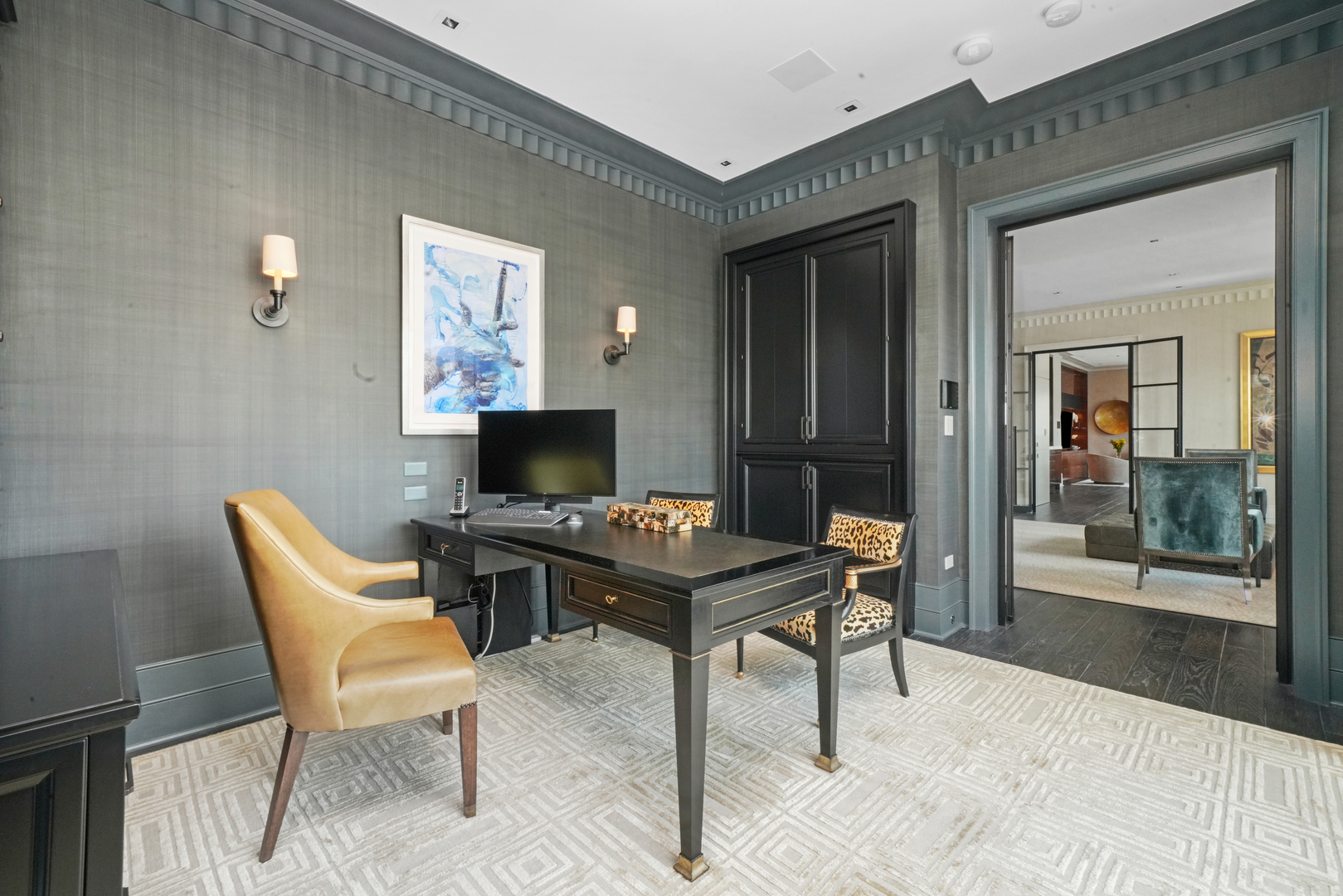 10 East Delaware Place, Unit 34A Chicago, IL 60611 - Photo 25 of 51 a living room with furniture a flat screen tv and a table