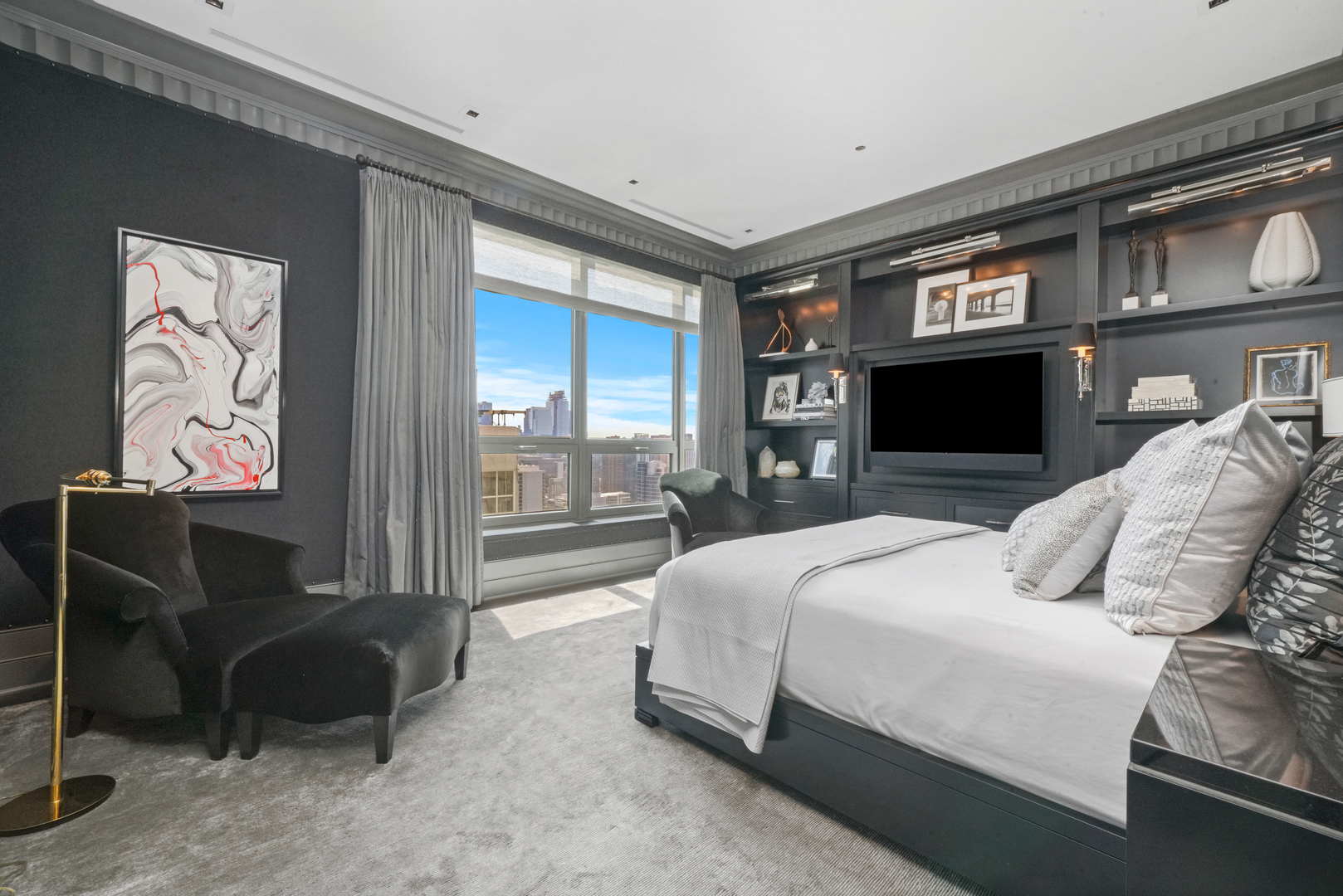 10 East Delaware Place, Unit 34A Chicago, IL 60611 - Photo 27 of 51 a bedroom with a bed and glass window