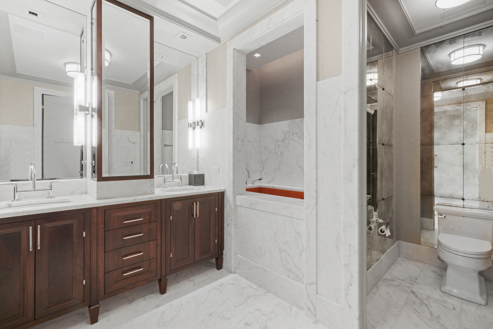 10 East Delaware Place, Unit 34A Chicago, IL 60611 - Photo 29 of 51 a spacious bathroom with a granite countertop sink mirror and toilet